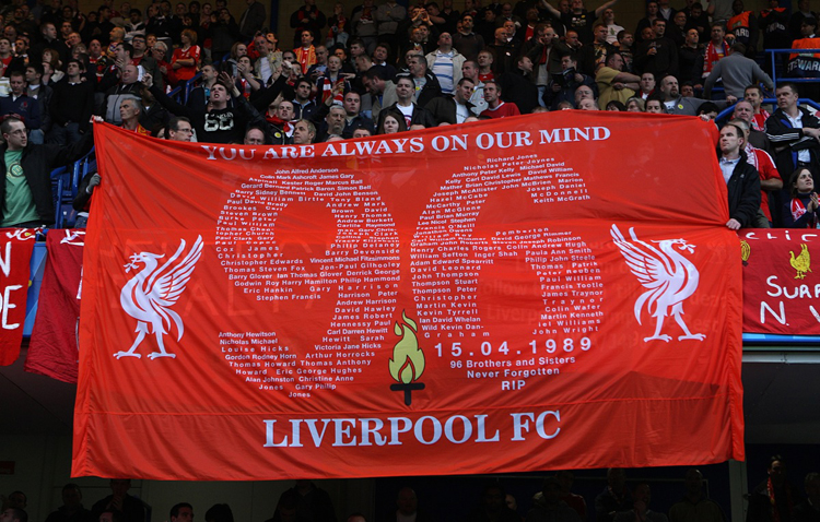 Liverpool fans display a banner in memory of the 96 victims of the Hillsborough tragedy